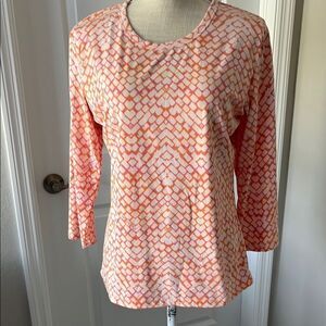 Michelle Paris’s Orange /Pink 3/4 Sleeve Tee for Effortless Style